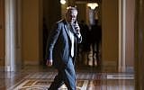 Senate Minority Leader Chuck Schumer, D-N.Y., makes a phone call just off the Senate floor on Capitol Hill in Washington, Wednesday, Aug. 1, 2018. (AP Photo/J. Scott Applewhite)