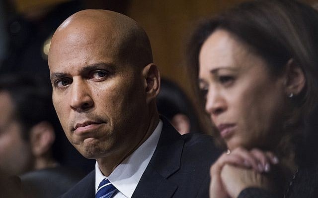 US Sen. Cory Booker, D-N.J., and Sen. Kamala Harris, D-Calif., listen as Dr. Christine Blasey Ford testifies during the Senate Judiciary Committee on September 27, 2018. (Tom Williams/Pool Photo via AP) US Sen. Cory Booker, D-N.J., and Sen. Kamala Harris, D-Calif., listen as Dr. Christine Blasey Ford testifies during the Senate Judiciary Committee on September 27, 2018. (Tom Williams/Pool Photo via AP)