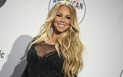 Mariah Carey poses in the press room at the American Music Awards on October 9, 2018, at the Microsoft Theater in Los Angeles. (Jordan Strauss/Invision/AP)