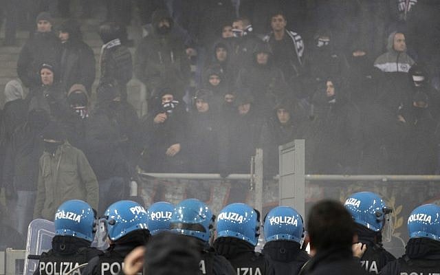 Anti riot police during a Europa League, Group H soccer match between Lazio and Eintracht Frankfurt at Rome's Olympic stadium, December 13, 2018. (AP Photo/Gregorio Borgia) Anti riot police during a Europa League, Group H soccer match between Lazio and Eintracht Frankfurt at Rome's Olympic stadium, December 13, 2018. (AP Photo/Gregorio Borgia)