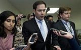 Sen. Marco Rubio, R-Fla., speaks with reporters on his way to the senate chamber, as the Senate takes up a House-passed bill that would pay for President Donald Trump's border wall and avert a partial government shutdown, at the Capitol in Washington, Friday, Dec. 21, 2018. (AP Photo/Jose Luis Magana)
