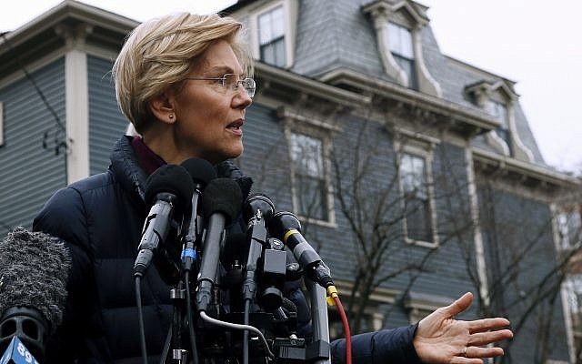 Sen. Elizabeth Warren, D-Mass., speaks outside her home, Monday, December 31, 2018, in Cambridge, Mass. Warren on Monday took the first major step toward launching a widely anticipated campaign for the presidency, hoping her reputation as a populist fighter can help her navigate a Democratic field that could include nearly two dozen candidates. (AP Photo/Bill Sikes) Sen. Elizabeth Warren, D-Mass., speaks outside her home, Monday, December 31, 2018, in Cambridge, Mass. Warren on Monday took the first major step toward launching a widely anticipated campaign for the presidency, hoping her reputation as a populist fighter can help her navigate a Democratic field that could include nearly two dozen candidates. (AP Photo/Bill Sikes)