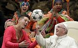 Pope Francis twirls a soccer ball he was presented by a member of the Circus of Cuba, during his weekly general audience in the Pope Paul VI hall, at the Vatican, Wednesday, Jan. 2, 2019. (AP/Andrew Medichini)
