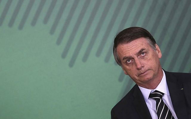 Brazil's President Jair Bolsonaro holds a ceremony to present his cabinet members at the presidential palace in Brasilia, Brazil, on January 2, 2019. (AP Photo/Eraldo Peres) Brazil's President Jair Bolsonaro holds a ceremony to present his cabinet members at the presidential palace in Brasilia, Brazil, on January 2, 2019. (AP Photo/Eraldo Peres)