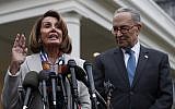 House Speaker Nancy Pelosi of California, left, and Senate Minority Leader Chuck Schumer speak to the media after meeting with US President Donald Trump on January 2, 2019. (AP Photo/Jacquelyn Martin)