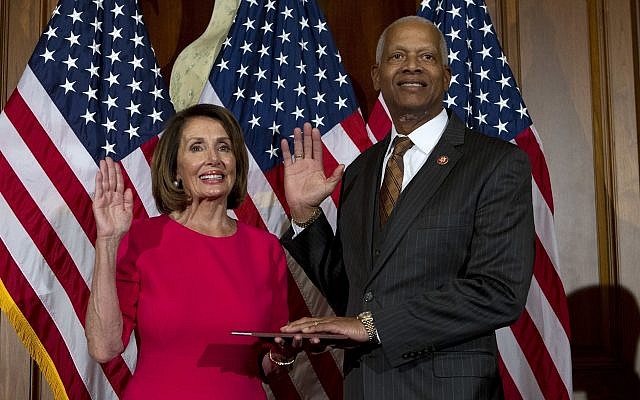House Speaker Nancy Pelosi administers the House oath of office to Rep. Hank Johnson, D-Georgia, during the ceremonial swearing-in of the 116th Congress on Capitol Hill in Washington, January 3, 2019. (AP/Jose Luis Magana) House Speaker Nancy Pelosi administers the House oath of office to Rep. Hank Johnson, D-Georgia, during the ceremonial swearing-in of the 116th Congress on Capitol Hill in Washington, January 3, 2019. (AP/Jose Luis Magana)