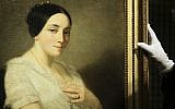 The painting 'Portrait of a Seated Young Woman' by Thomas Couture stands on a easel during a restitution ceremony to the heirs of Jewish French politician Georges Mandel in Berlin on January 8, 2019. (AP Photo/Markus Schreiber)