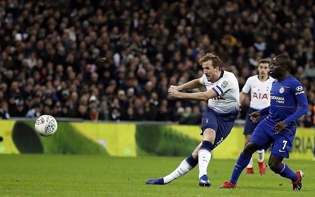 Tottenham's Harry Kane shoots the ball during the English League Cup semifinal first leg soccer match between Tottenham Hotspur and Chelsea at Wembley Stadium in London, Tuesday, Jan. 8, 2019. (AP Photo/Frank Augstein) Tottenham's Harry Kane shoots the ball during the English League Cup semifinal first leg soccer match between Tottenham Hotspur and Chelsea at Wembley Stadium in London, Tuesday, Jan. 8, 2019. (AP Photo/Frank Augstein)