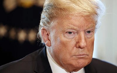 US President Donald Trump attends a roundtable discussion on border security with local leaders, Friday January 11, 2019, in the Cabinet Room of the White House in Washington (AP Photo/Jacquelyn Martin)