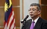 Malaysia Foreign Minister Saifuddin Abdullah speaks during a press conference in Putrajaya, Malaysia, Jan. 16, 2019 (AP Photo/Yam G-Jun)