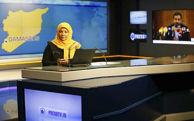 This undated photo provided by Iranian state television's English-language service, Press TV, shows American-born news anchor Marzieh Hashemi at studio in Tehran, Iran. (Press TV via AP) This undated photo provided by Iranian state television's English-language service, Press TV, shows American-born news anchor Marzieh Hashemi at studio in Tehran, Iran. (Press TV via AP)