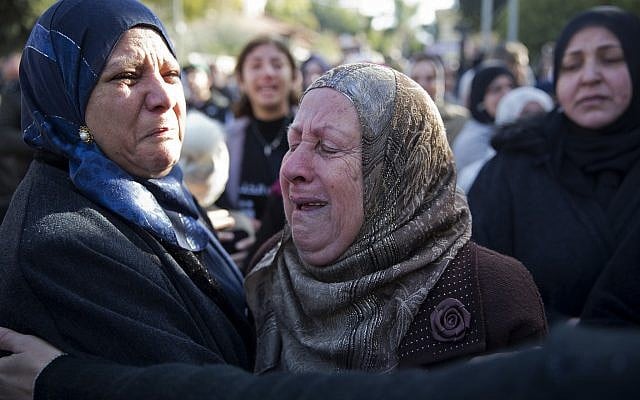 Women cry during the funeral of Israeli student Aya Maasarwe in Baqa al-Gharbiya, Jan. 23, 2019 (AP Photo/Ariel Schalit) Women cry during the funeral of Israeli student Aya Maasarwe in Baqa al-Gharbiya, Jan. 23, 2019 (AP Photo/Ariel Schalit)