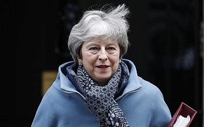 Britain's Prime Minister Theresa May leaves 10 Downing Street for the House of Commons for her weekly Prime Minister's Questions in London, January 23, 2019. (AP Photo/Alastair Grant)