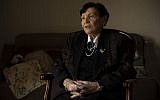 In this, Jan. 23, 2019 photo, Holocaust survivor Cipora Feivlovich speaks to The Associated Press at her house in Jerusalem  (AP Photo/Sebastian Scheiner)