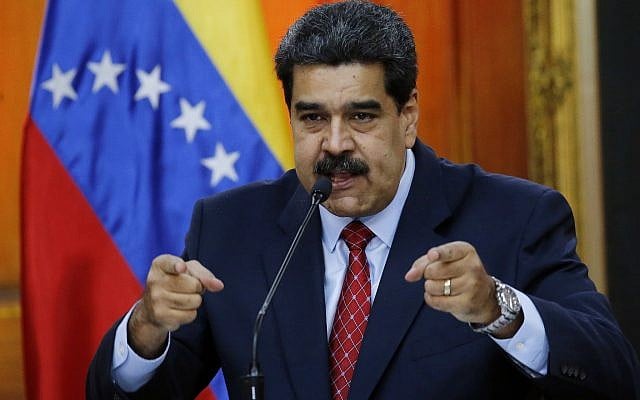 Venezuelan President Nicolas Maduro gives a press conference at Miraflores presidential palace in Caracas, Venezuela, Friday, Jan. 25, 2019, amid a political power struggle between him and an opposition leader who has declared himself interim president. (AP/Ariana Cubillos)