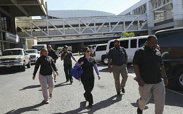 United States embassy security agents walk after dropping off US embassy employees and their families at the Simon Bolivar international airport in La Guaira, Venezuela, Friday, Jan. 25, 2018. (AP/Rodrigo Abd) United States embassy security agents walk after dropping off US embassy employees and their families at the Simon Bolivar international airport in La Guaira, Venezuela, Friday, Jan. 25, 2018. (AP/Rodrigo Abd)