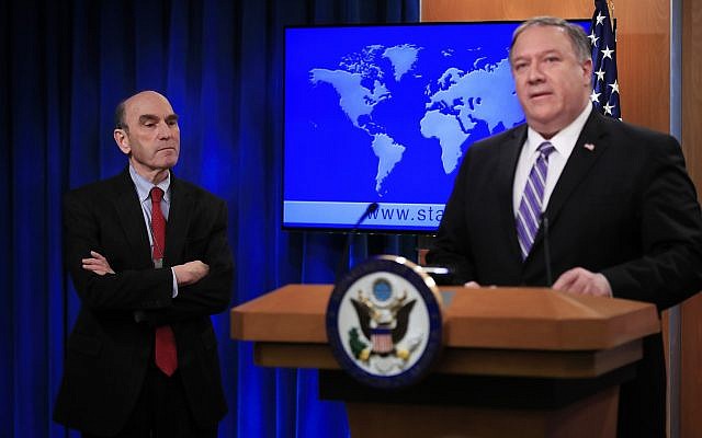 Elliott Abrams (L) listens to Secretary of State Mike Pompeo talk about Venezuela at the State Department in Washington, on Jan. 25, 2019. (AP Photo/Manuel Balce Ceneta)