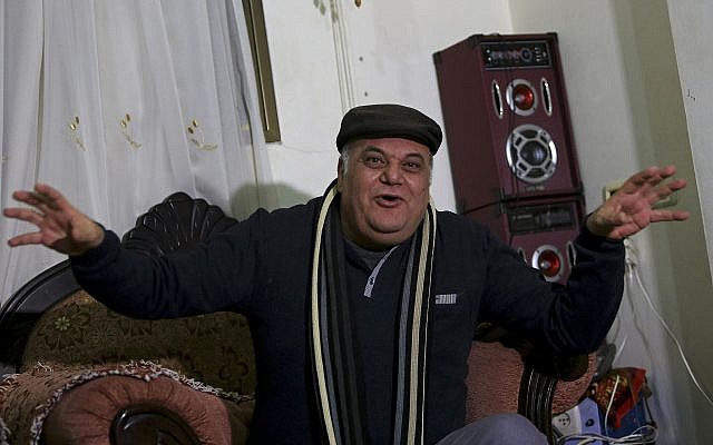 Palestinian actor and playwright Ali Abu Yaseen, 55, gives an interview in his home at the Shati refugee camp in Gaza City on Tuesday. (AP Photo/Adel Hana) Palestinian actor and playwright Ali Abu Yaseen, 55, gives an interview in his home at the Shati refugee camp in Gaza City on Tuesday. (AP Photo/Adel Hana)