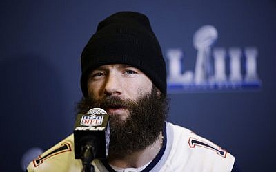 New England Patriots' Julian Edelman speaks with members of the media during a news conference Wednesday, Jan. 30, 2019, ahead of the NFL Super Bowl 53 football game against Los Angeles Rams in Atlanta. (AP Photo/Matt Rourke)