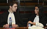 Matthieu Danloy, left, and Aurelia Psalti, lawyers of the family of victims Emmanuel and Miriam Riva, talk before the start of the trial of Mehdi Nemmouche at the Justice Palace in Brussels, on January 31, 2019. (John Thys, Pool Photo via AP)
