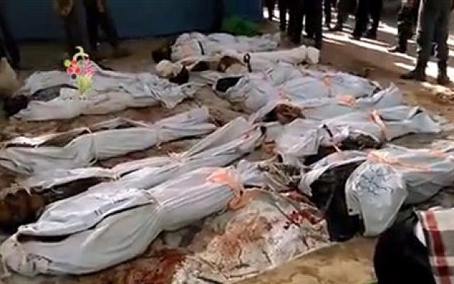 This image posted online by the Shaam News Network, a loosely organized group opposed to Bashar Assad, on Sunday, Aug. 16, 2015, which has been verified and is consistent with other AP reporting, shows the bodies of people killed in Syrian government airstrikes in Douma, a suburb of Damascus, Syria. The United Nations humanitarian chief said he is "horrified" by the attacks on civilians taking place in Syria, singling out in particular government airstrikes the previous day that killed nearly 100 people in a Damascus suburb. (Shaam News Network via AP video) This image posted online by the Shaam News Network, a loosely organized group opposed to Bashar Assad, on Sunday, Aug. 16, 2015, which has been verified and is consistent with other AP reporting, shows the bodies of people killed in Syrian government airstrikes in Douma, a suburb of Damascus, Syria. The United Nations humanitarian chief said he is "horrified" by the attacks on civilians taking place in Syria, singling out in particular government airstrikes the previous day that killed nearly 100 people in a Damascus suburb. (Shaam News Network via AP video)