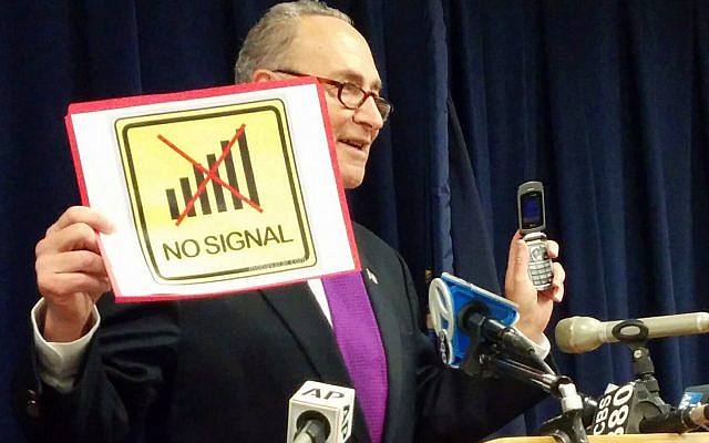 With a flip phone in one hand, and a "no signal" sign in the other, Sen. Charles Schumer speaks about improving New Yorkers' cellphone service by tracking dead zones where calls are regularly dropped, in New York, Sunday, Jan. 17, 2016. (AP Photo/Julie Walker) With a flip phone in one hand, and a "no signal" sign in the other, Sen. Charles Schumer speaks about improving New Yorkers' cellphone service by tracking dead zones where calls are regularly dropped, in New York, Sunday, Jan. 17, 2016. (AP Photo/Julie Walker)