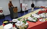 Chef Kevin Gillespie (R) at the Arnold Bread National Sandwich Day Event in Atlanta, November 3, 2014. (Photo by John Amis/Invision for Bimbo Bakeries USA/AP Images)