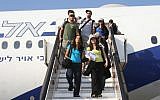 Illustrative: New immigrants to Israel stepping off the plane at Ben Gurion Airport. (Courtesy Nefesh B'Nefesh/via JTA)