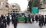 Screen capture from video of ultra-Orthodox demonstrators protesting in Jerusalem against the planned autopsy of a baby, January 2, 2019. (YouTube)