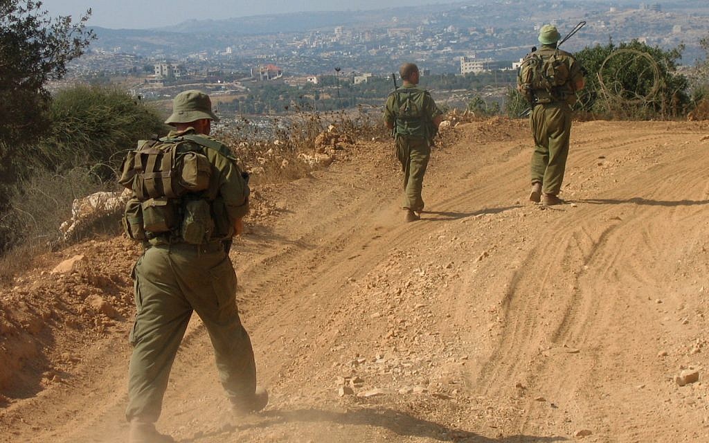 Illustrative: IDF reservists patrolling along the Lebanese border near the Israeli village of Zar'it. (Roy Sharon/Flash90) Illustrative: IDF reservists patrolling along the Lebanese border near the Israeli village of Zar'it. (Roy Sharon/Flash90)