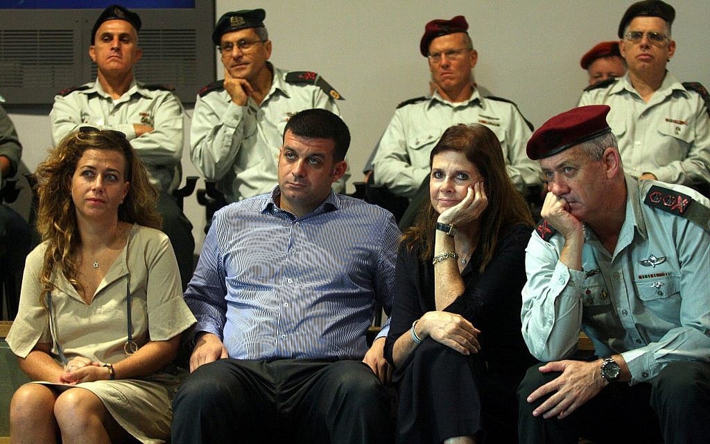 Then chief of staff Benny Gantz sits with members of the Rabin family at a seminar at the Yitzhak Rabin Center in October 2012 marking the anniversary of prime minister Yitzhak Rabin's assassination. (Roni Schutzer/Flash90) Then chief of staff Benny Gantz sits with members of the Rabin family at a seminar at the Yitzhak Rabin Center in October 2012 marking the anniversary of prime minister Yitzhak Rabin's assassination. (Roni Schutzer/Flash90)