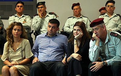Then chief of staff Benny Gantz sits with members of the Rabin family at a seminar at the Yitzhak Rabin Center in October 2012 marking the anniversary of prime minister Yitzhak Rabin's assassination. (Roni Schutzer/Flash90)