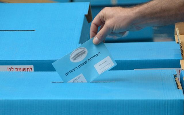Illustrative: A vote is cast in Knesset elections on February 25, 2015. (Flash90)