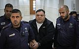 Daniel Nachmani, the suspect in the murder of teenager Noa Eyal in 1998, arrives at the Jerusalem District Court on January 3, 2019. (Yonatan Sindel/Flash90)