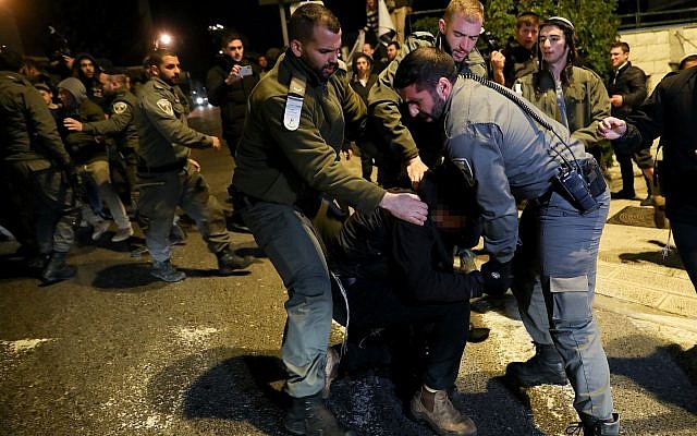 Police arrest a man during a protest outside the Prime Minister's Residence in Jerusalem, in support of the Jewish youth suspects in a major security probe whose details are under gag order, January 5, 2019 (Noam Revkin Fenton/Flash90) Police arrest a man during a protest outside the Prime Minister's Residence in Jerusalem, in support of the Jewish youth suspects in a major security probe whose details are under gag order, January 5, 2019 (Noam Revkin Fenton/Flash90)