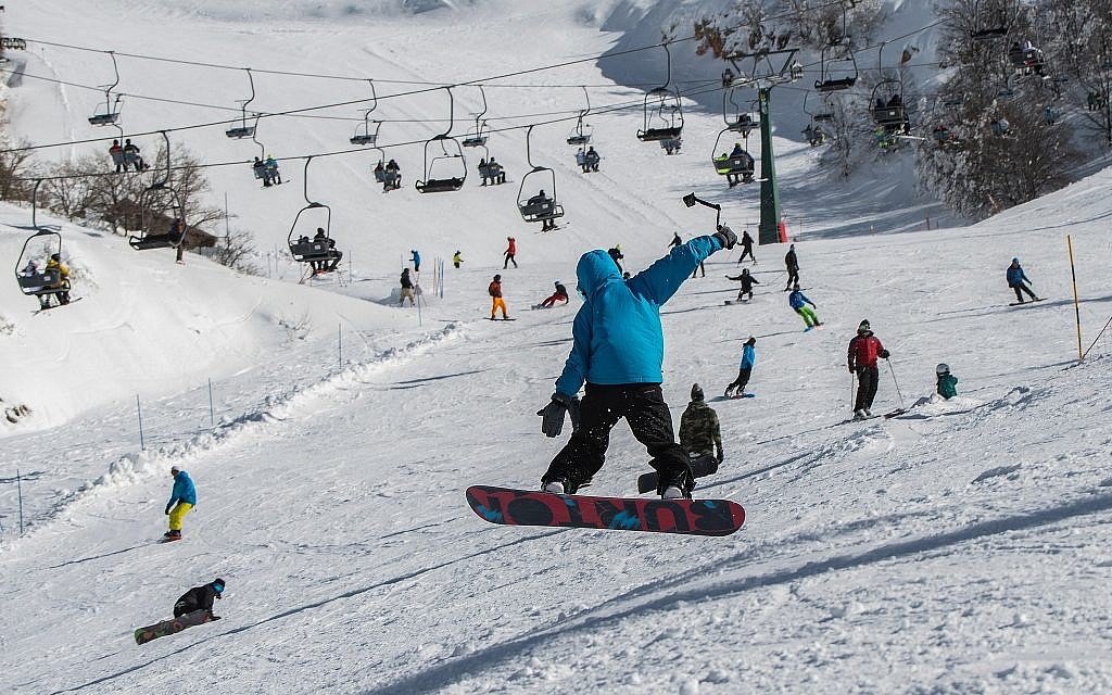 Israelis ski and snowboard on Mount Hermon on January 11, 2019. (Basel Awidat/Flash90) Israelis ski and snowboard on Mount Hermon on January 11, 2019. (Basel Awidat/Flash90)