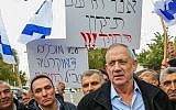 Former IDF chief of staff Benny Gantz seen with members of the Druze community and activists outside his home in Rosh Ha'ayin, during a protest against the nation-state law, January 14, 2019. (Flash90)