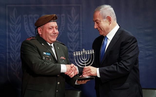 Prime Minister Benjamin Netanyahu (R) and outgoing IDF Chief of Staff Gabi Eisenkot at a ceremony at Defense Ministry headquarters in Tel Aviv on January 15, 2019. (Flash90) Prime Minister Benjamin Netanyahu (R) and outgoing IDF Chief of Staff Gabi Eisenkot at a ceremony at Defense Ministry headquarters in Tel Aviv on January 15, 2019. (Flash90)