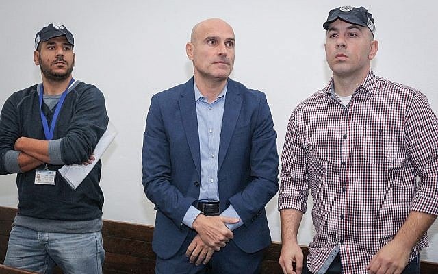 Israel Bar Association former chairman Efi Nave (center) at a Tel Aviv court on January 16, 2019 (Koko/Pool/Flash90) Israel Bar Association former chairman Efi Nave (center) at a Tel Aviv court on January 16, 2019 (Koko/Pool/Flash90)