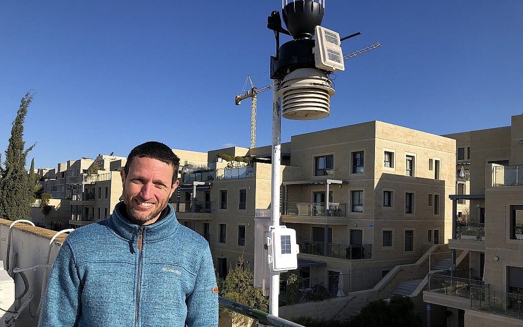 Boaz Nehemia of Yerushamayim, Jerusalem's local weather forecaster, who forecasts the weather with his home weather station on the roof of his building (Jessica Steinberg/Times of Israel) Boaz Nehemia of Yerushamayim, Jerusalem's local weather forecaster, who forecasts the weather with his home weather station on the roof of his building (Jessica Steinberg/Times of Israel)