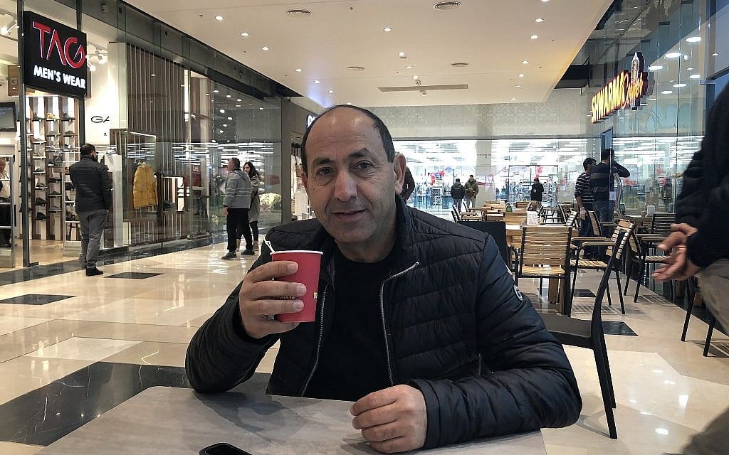 Supermarket king Rami Levy drinks coffee at Atarot Mall, his new complex on the seam of Arab and Jewish Jerusalem (Jessica Steinberg/Times of Israel) Supermarket king Rami Levy drinks coffee at Atarot Mall, his new complex on the seam of Arab and Jewish Jerusalem (Jessica Steinberg/Times of Israel)