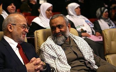 Mohammad Reza Naqdi, right, at a conference in Tehran in July 2012, sitting next to former Iraqi prime minister Ibrahim al-Jaafari. (Wikipedia/sayyed shahab-o-din vajedi/CC BY)