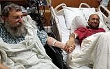 Altruistic liver donor Rabbi Ephraim Simon, left, and recipient Adam Levitz meet prior to surgery at the Cleveland Clinic. (Courtesy Chabad)