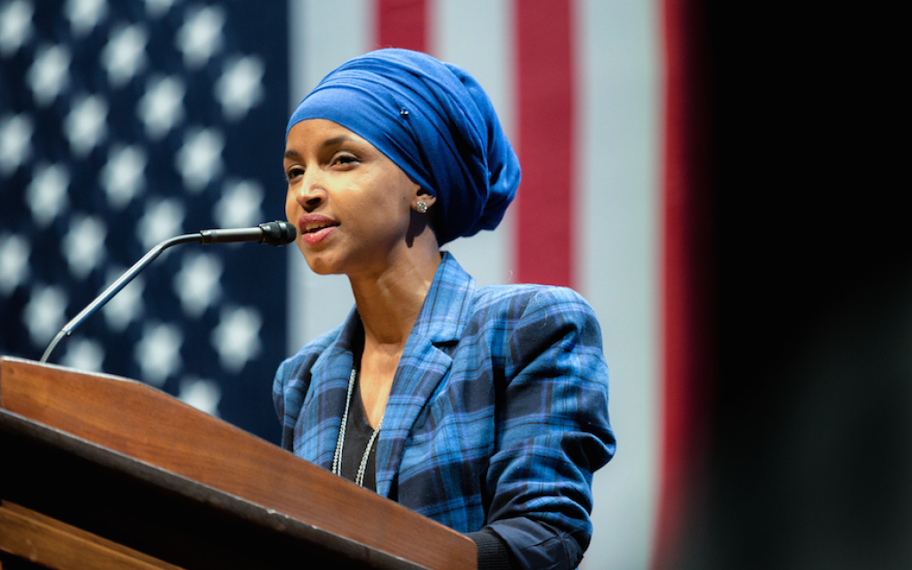 Ilhan Omar, then a candidate for US Congress, speaks at a Hillary for Minnesota event at the University of Minnesota in October 2016. (Lorie Shaull/Flickr/via JTA) Ilhan Omar, then a candidate for US Congress, speaks at a Hillary for Minnesota event at the University of Minnesota in October 2016. (Lorie Shaull/Flickr/via JTA)