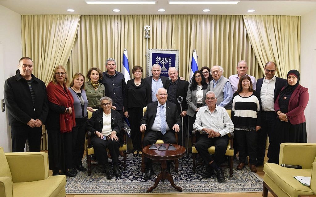 Israeli President Reuven Rivlin receives ERAN delegates at his residence, February 2018. Rivlin's daughter is a volunteer with ERAN. (Courtesy)