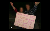 Screenshot of the Minnesota high school students doing the Nazi salute with a Hitler-themed invitation to their school dance on January 2019. (screen capture: YouTube)