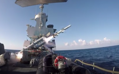An Israeli Navy Sa'ar-4.5 corvette fires a Harpoon cruise missile at a decrepit cargo ship as part of an exercise in January 2019. (Screen capture: Israel Defense Forces)