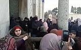 Muslim worshipers square off with police outside the Al-Aqsa Mosque in Jerusalem, January 14, 2019. (YouTube screenshot)