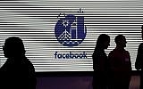 Media and guests mingle at a tour of Facebook's new 130,000-square-foot offices in Cambridge, Massachusetts, January 9, 2019. (AP Photo/Elise Amendola)