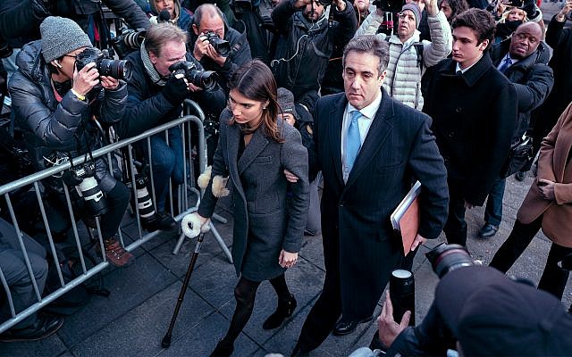 Michael Cohen, center, President Donald Trump's former lawyer, accompanied by his children Samantha, left, and Jake, right, arrives at federal court for his sentencing, December 12, 2018, in New York, for dodging taxes, lying to Congress and violating campaign finance laws. (AP Photo/Craig Ruttle) Michael Cohen, center, President Donald Trump's former lawyer, accompanied by his children Samantha, left, and Jake, right, arrives at federal court for his sentencing, December 12, 2018, in New York, for dodging taxes, lying to Congress and violating campaign finance laws. (AP Photo/Craig Ruttle)
